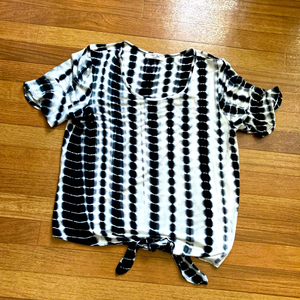 Black and white. Has tie at bottom. Size medium. By Juju. Bell sleeves. Soft.